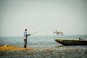 FATHER LANDRY FISHING AT NICKEL REEF - COLOR